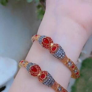 Ruby Infinity Gold-Plated Statement Bangles — Article 46